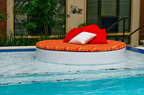 Rounded pool sunbed